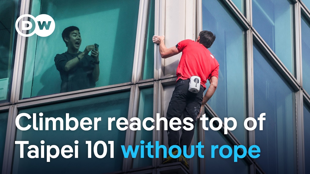 US climber Alex Honnold completes rope-free climb up Taipei 101 skyscraper | DW News
