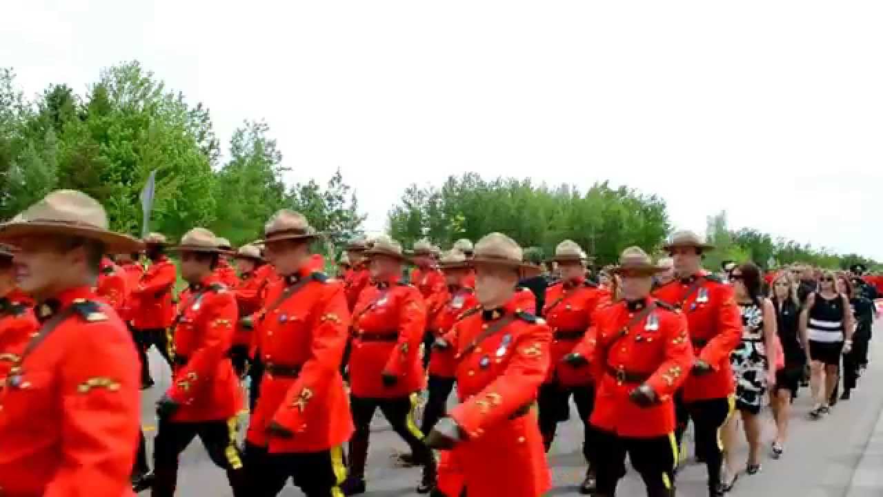 Thousands attend RCMP regimental funeral service for Moncton officers- Canada