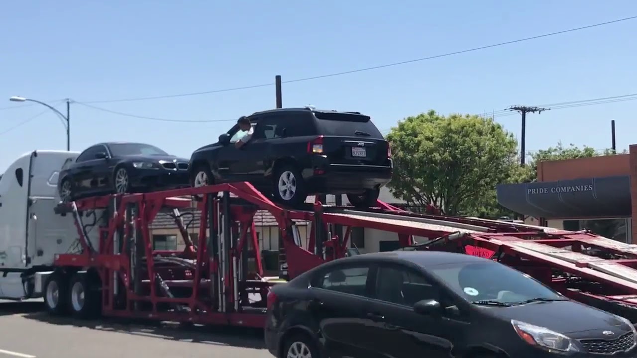 LOADING A CAR ON THE OPEN CARRIER (Global Auto Transportation)
