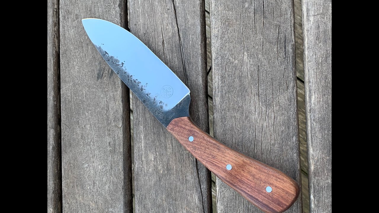Forging a Camp Knife from salvaged farm equipment.