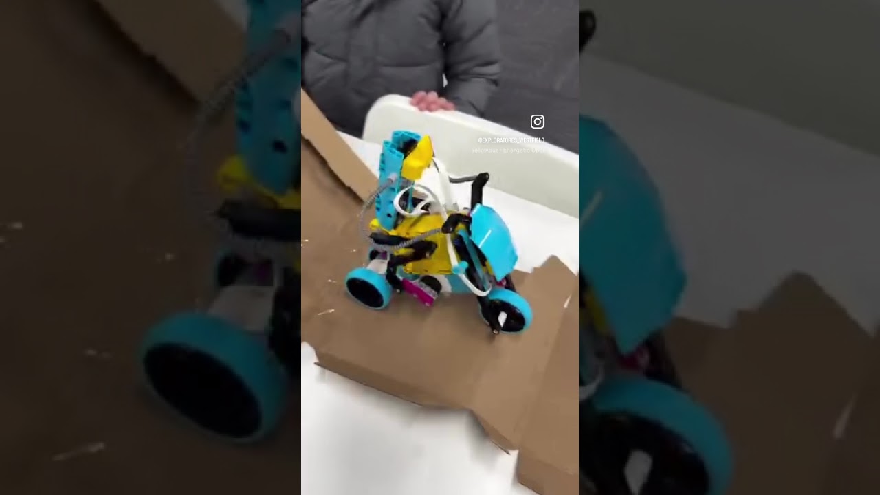 Watch Kids Build and Code a LEGO Robot