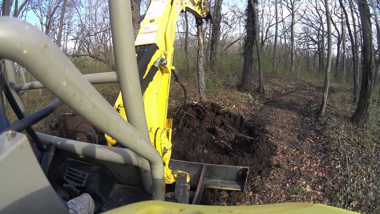 Yanmar Vio35-5 knocking down trees