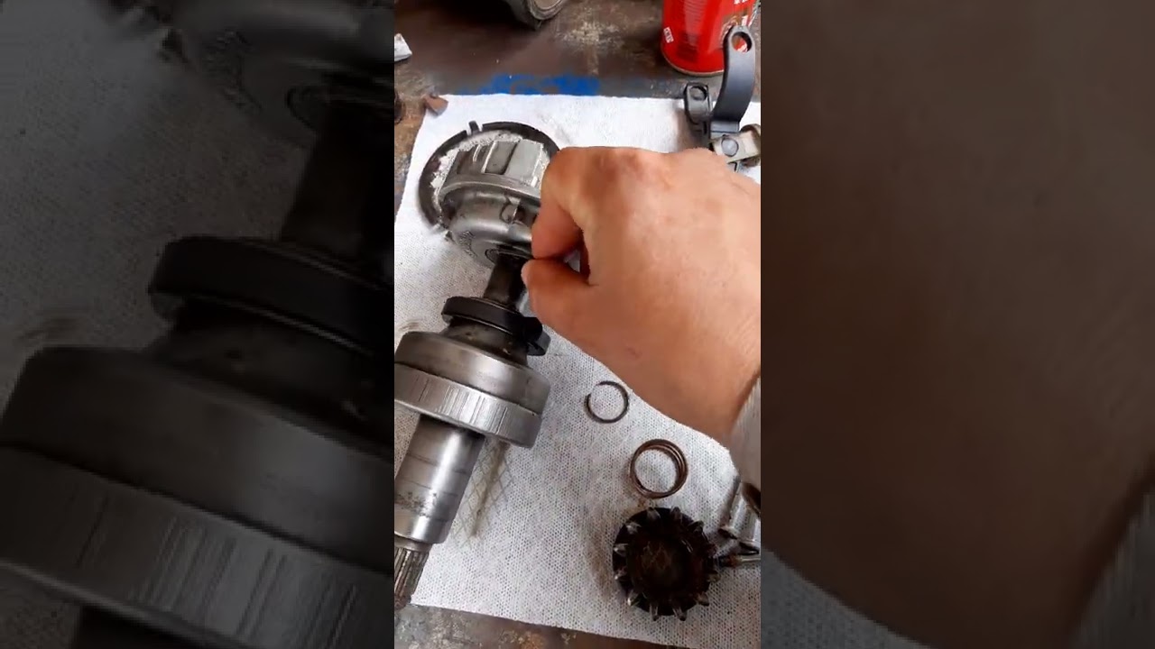 como desmontar o impulso de  partida do motor de partida do SCANIA