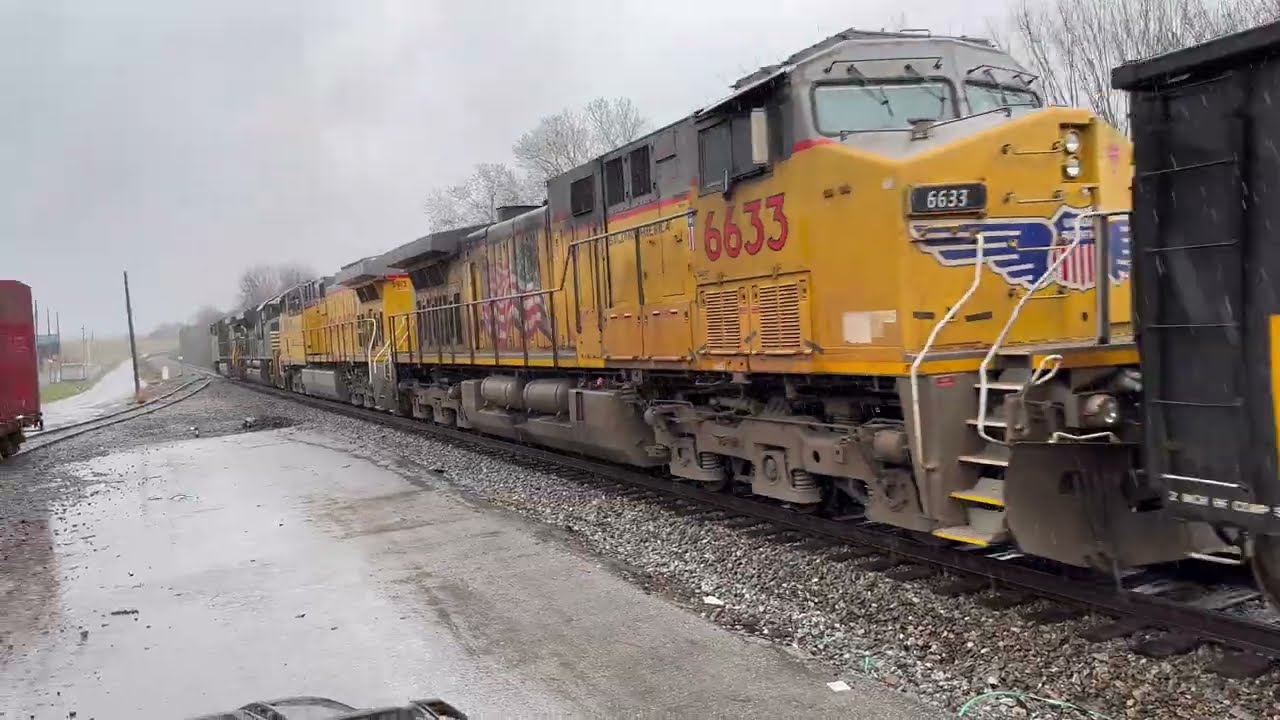 AC44C6M 4303 leads WB 127 with a sick sounding horn and 2 Union Pacific engines 3/8/2026.