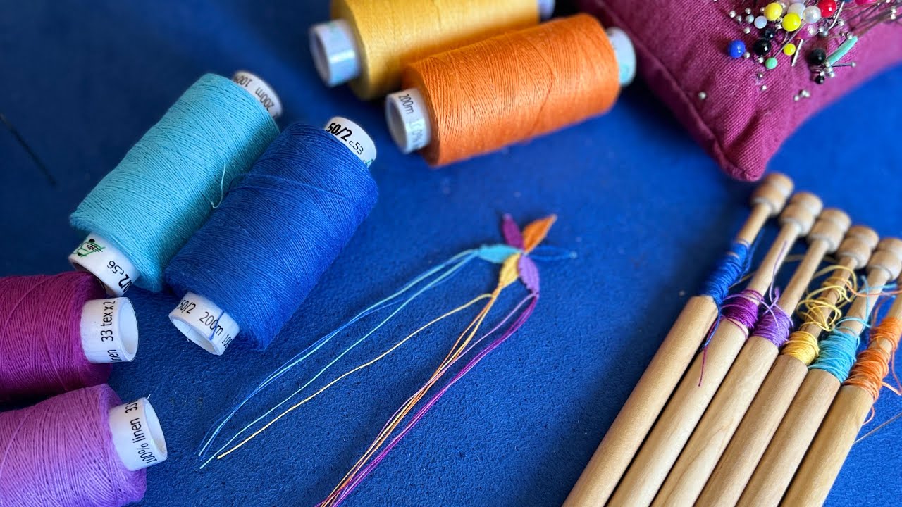 Roseton de Guipur a 6 colores encaje de bolillos Raquel M Adsuar Bolillotuber