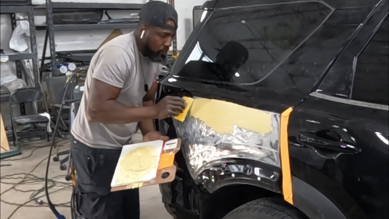 DIY# bondo work and metal straightening on a damage SUV