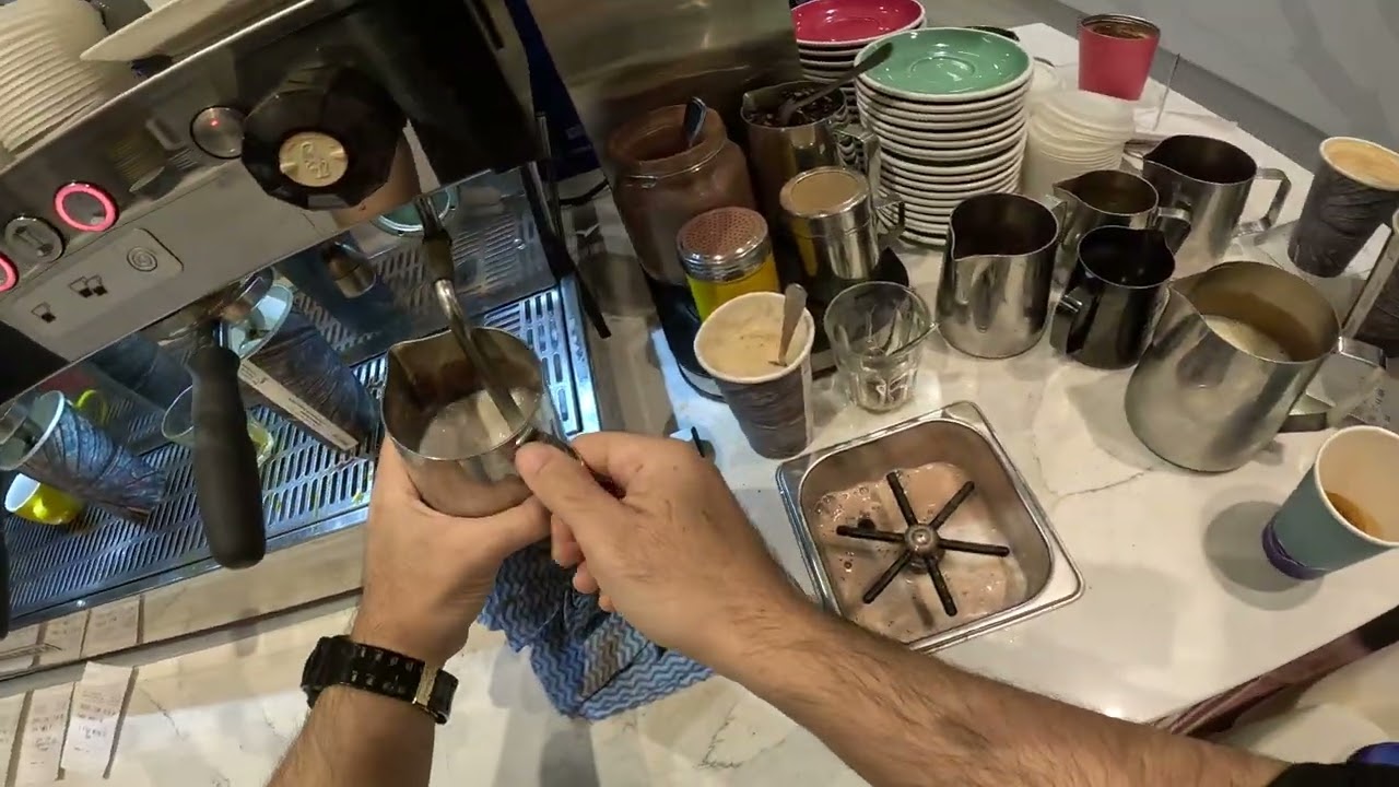 POV barista work in a morning rush in a Melbourne cafe