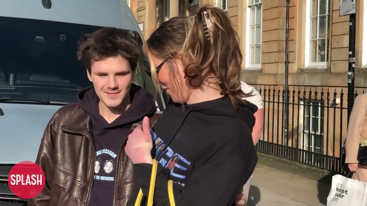 Cruz Beckham Signs Autographs For Fans And Poses With A Spice Girls Fan In Glasgow, Scotland