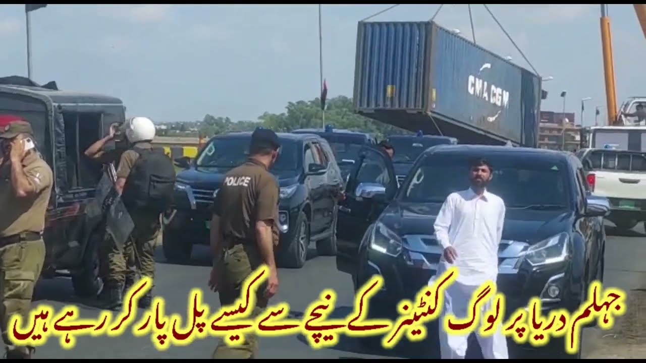 Close Jhelum river bridge | people are crossing the bridge under the container