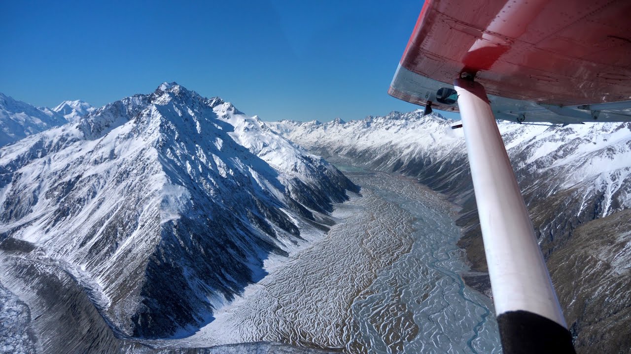 New Zealand Southern Alps winter flight and glacier landing - Mount Cook