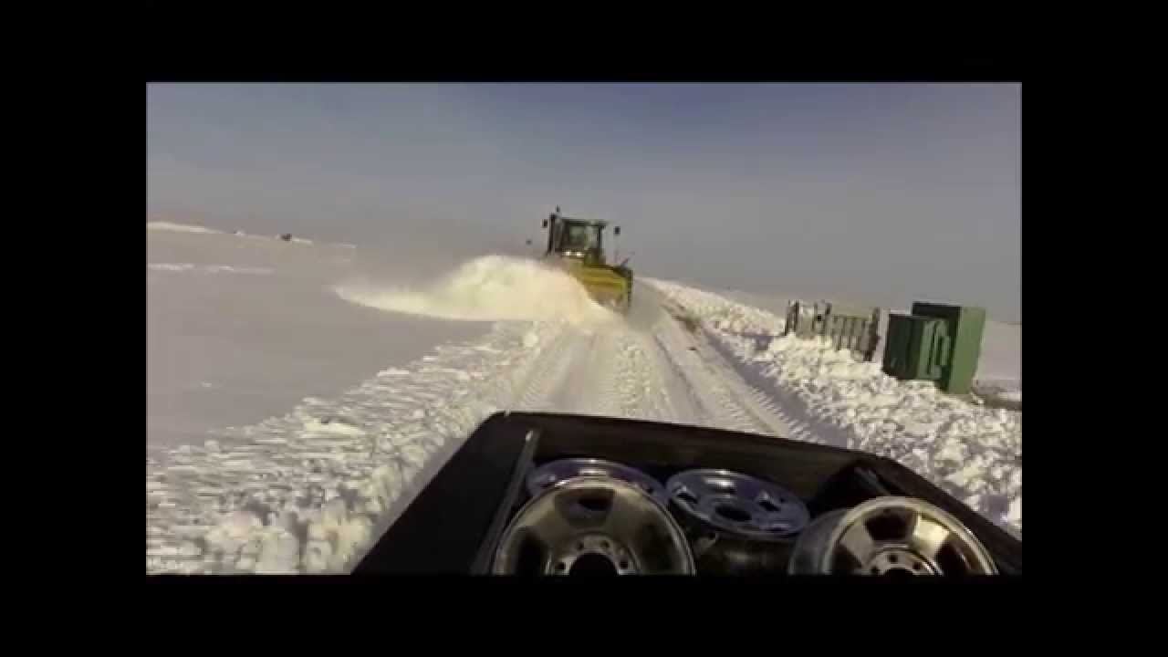 john deere 9220 tractor pushing snow