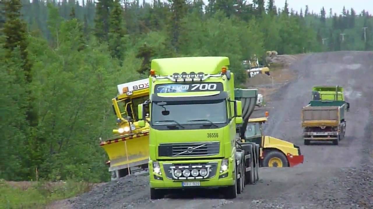 Veekmas grader  and Volvo FH16 700 8x4 in Roadconstruction