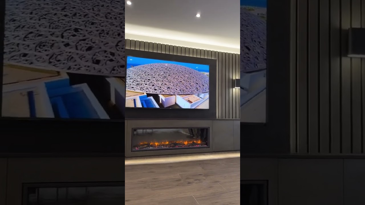 Media wall with electric fireplace #bespoke #led #decor #mediawall custom