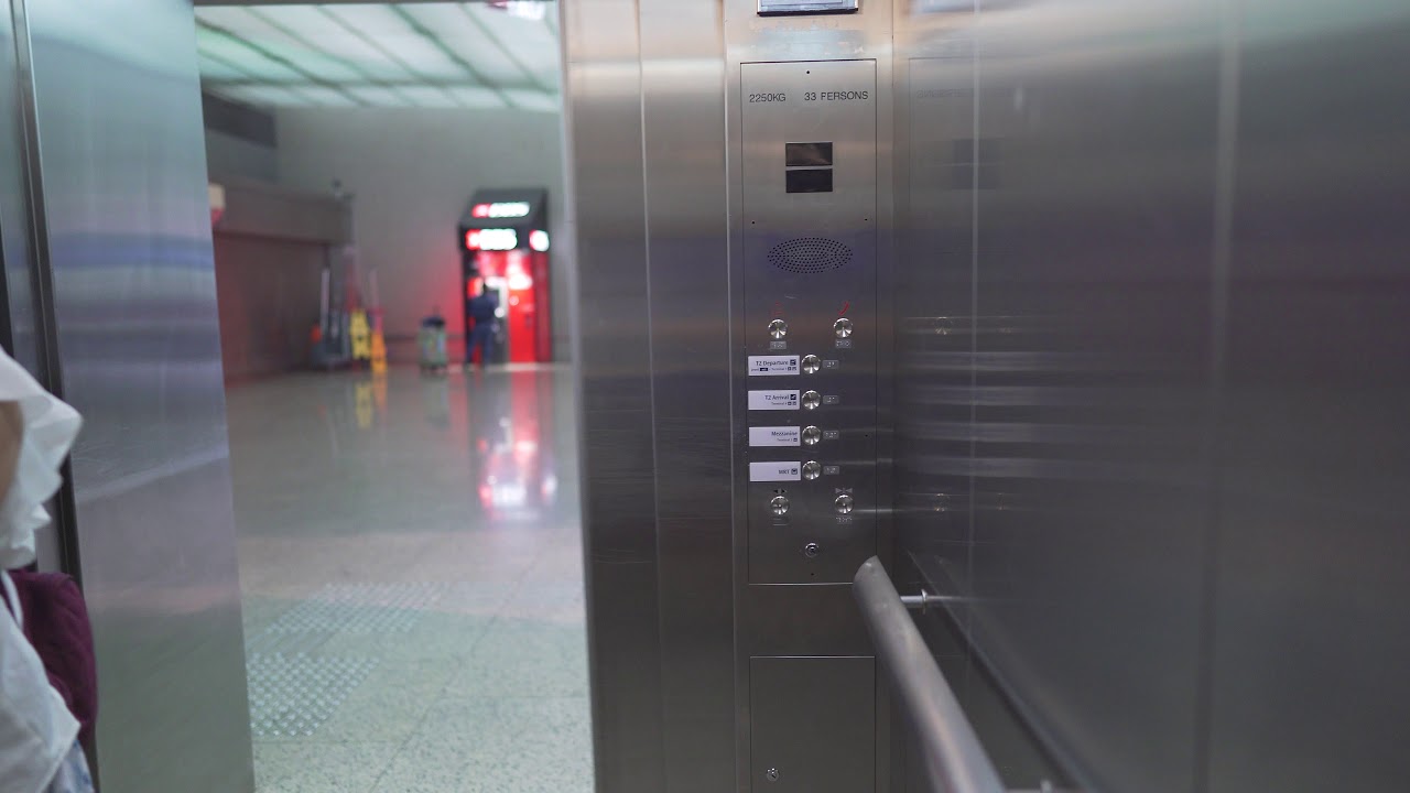 Singapore, Changi Airport, elevator ride down to MRT Level