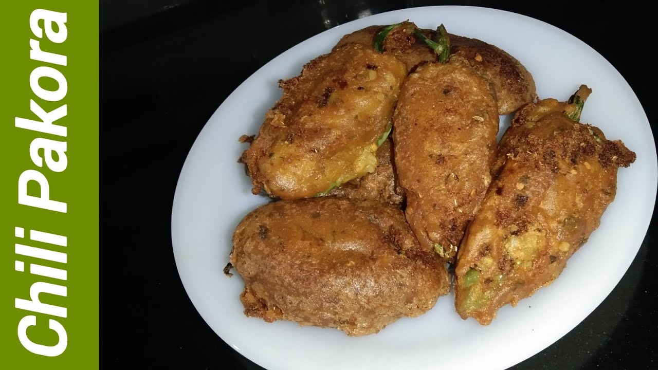 Chili stuffed Pakora recipe by cooking with sumra 