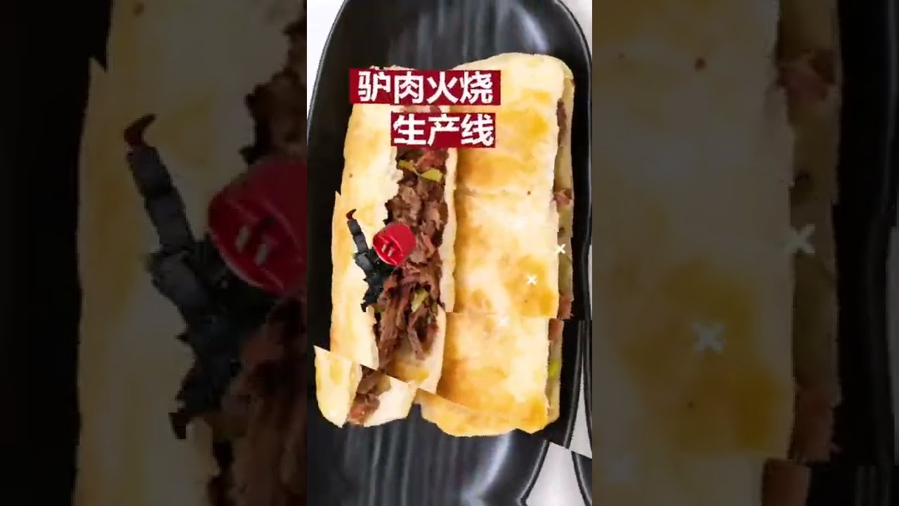 Our factory supply this Donkey meat fire#驴肉火烧 production line, just like the paratha production line