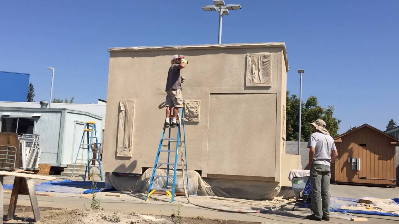 Applying first coat of OBC Cork on a Tiny House - San Jose CA
