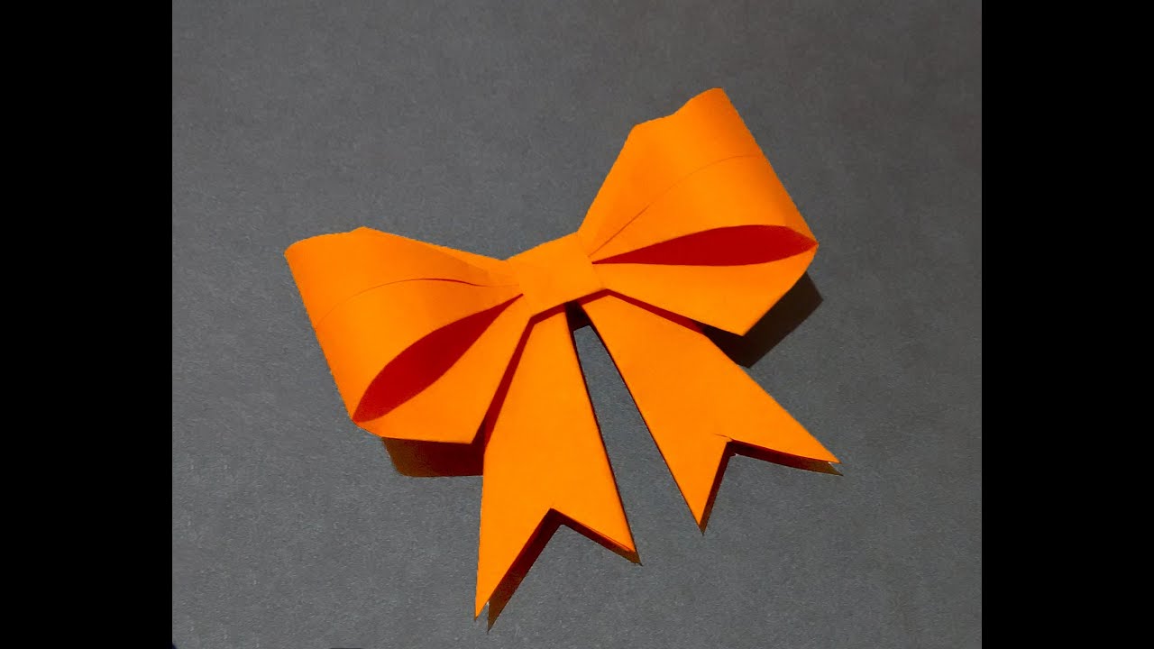Paper bow / ribbon. Ideas for decor. Origami bow for gift box decoration.