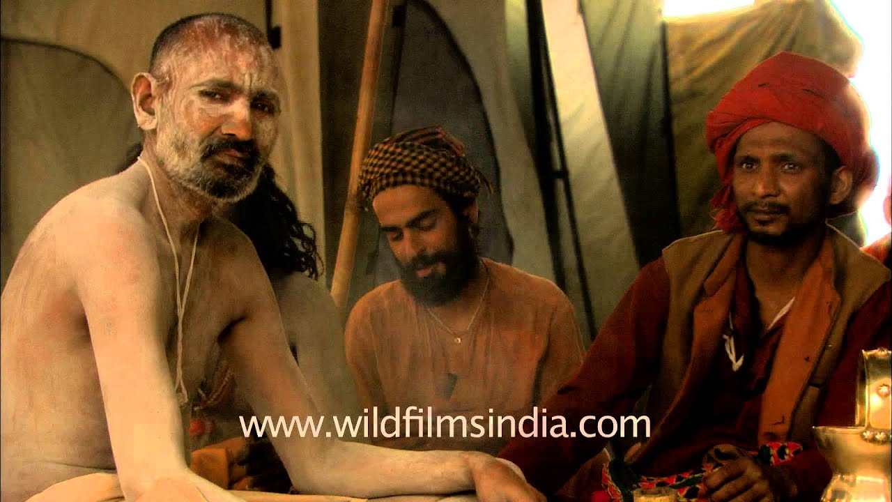 Naga Sadhus smoking 'Chillum'  inside their tents in Varanasi