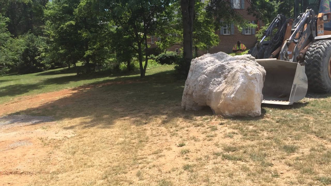 Moving rock into place