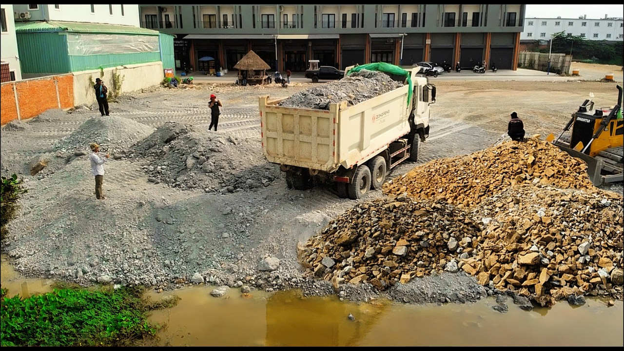 Awesome! Nicely Working! Filling Land Soil into The Water Operation By Dump Trucks 25T SHANTUI DOZER