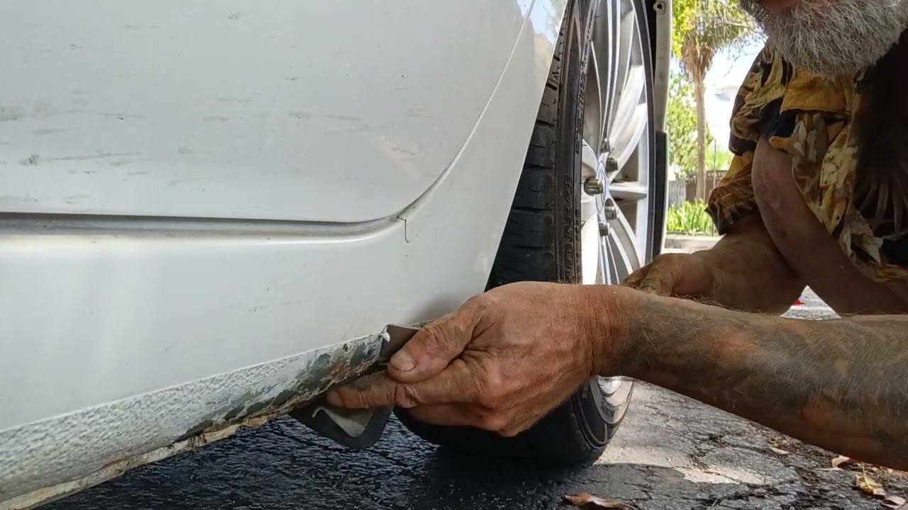 Removing rust with scraper...