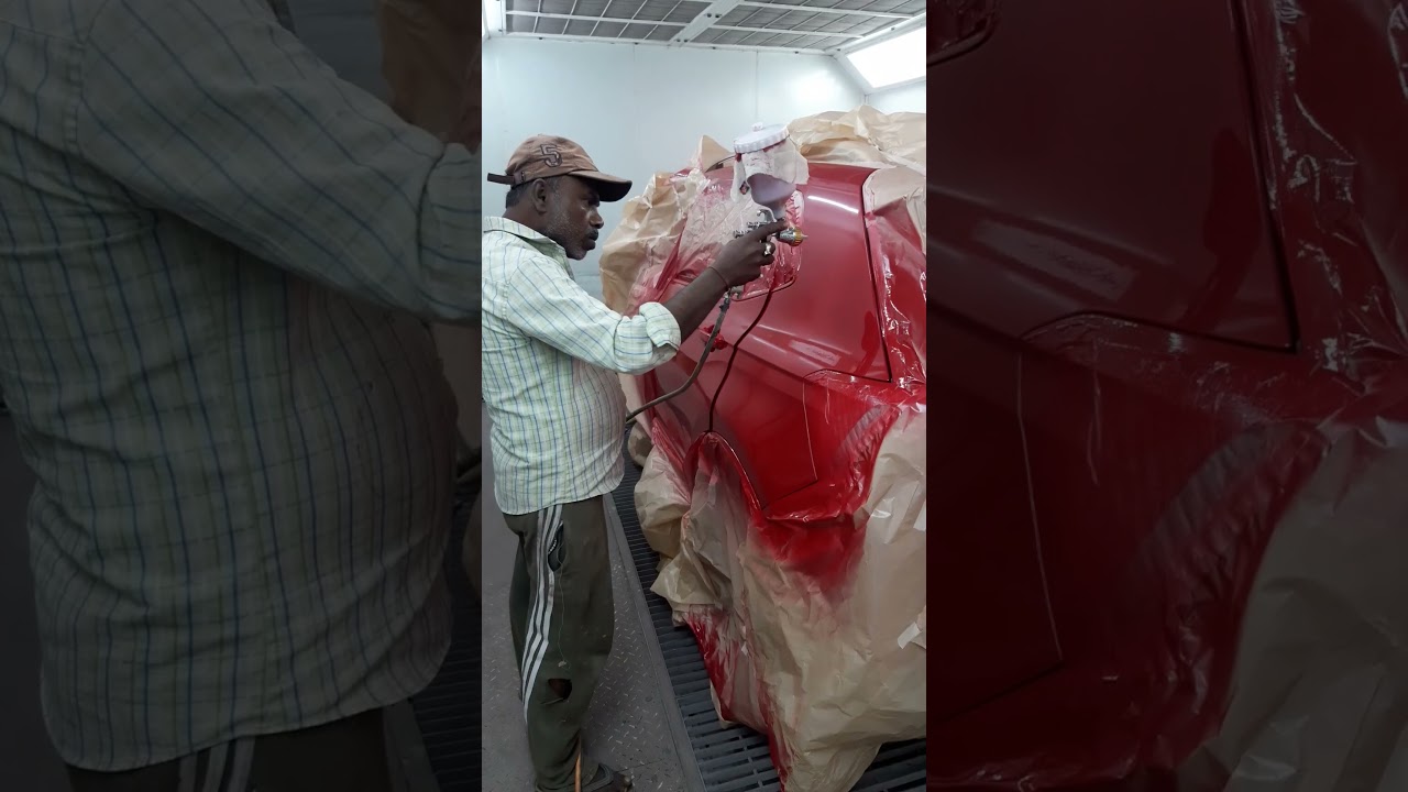 Car painting job is in progress inside our paint booth.