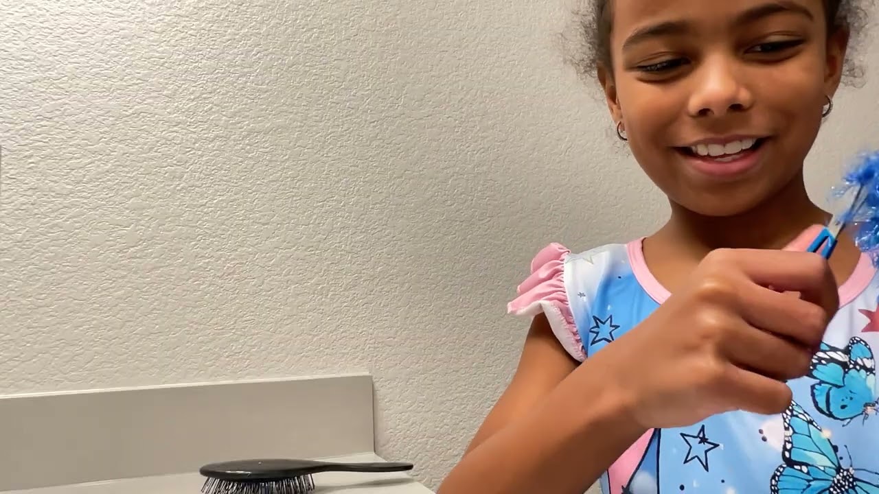 Doing a butterfly haircut on my doll 🦋￼