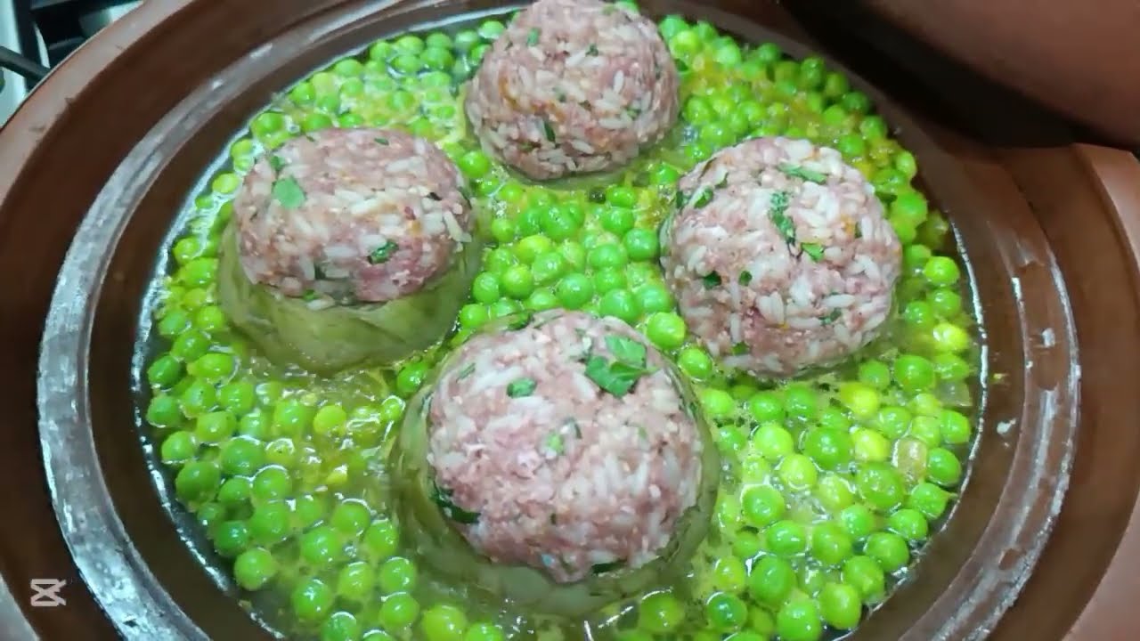 شاركت معكم سبب غلاء الخضرمع طجين قوق محشو بالكفتة والجلبانة