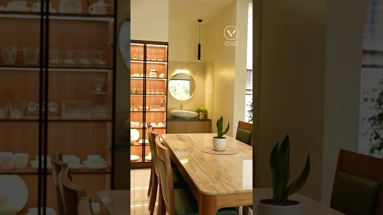 Double-height drama with a cozy twist — living, dining, and kitchen in harmony.