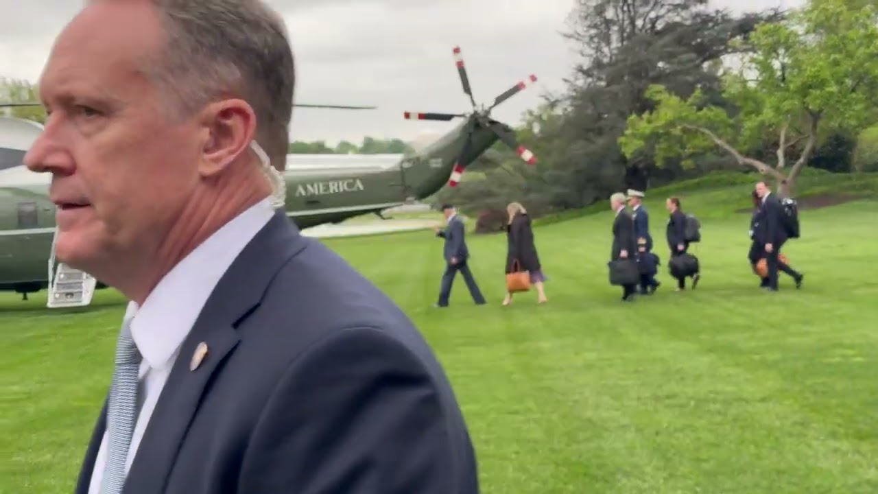 Staff boarding Marine One on April 19, 2024