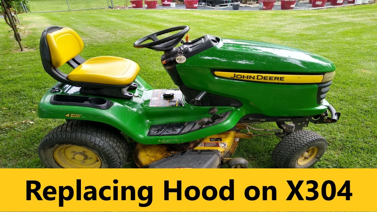 Замена капота на садовом тракторе John Deere X304