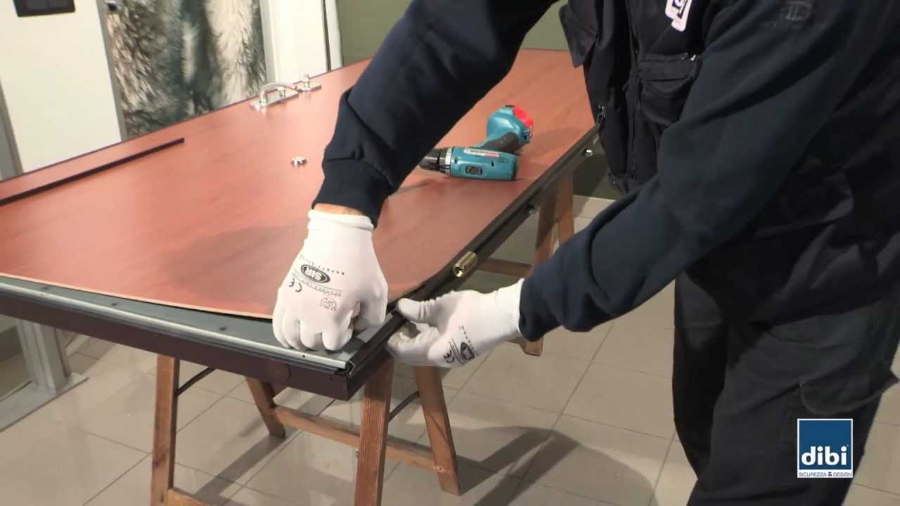Sostituzione cerniera su anta DI.BI. Porte Blindate