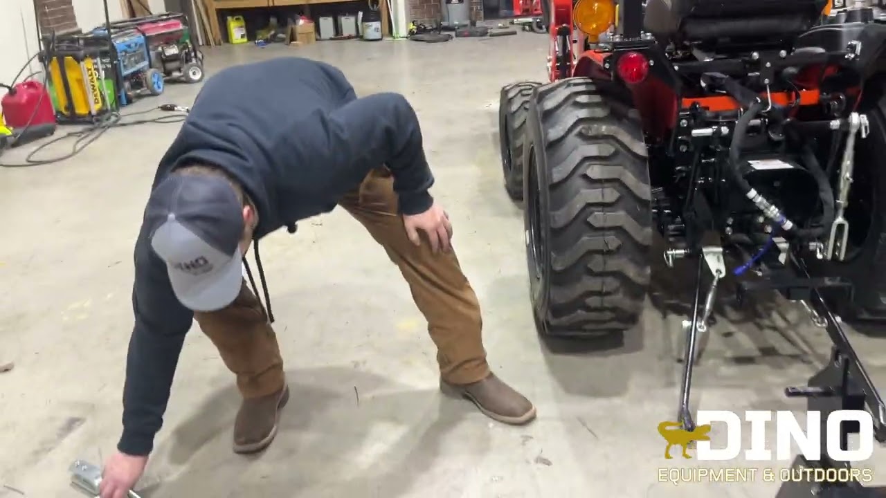 HOW TO TAKE OFF AND PUT BACK ON A BACKHOE ON A BAD BOY 1025