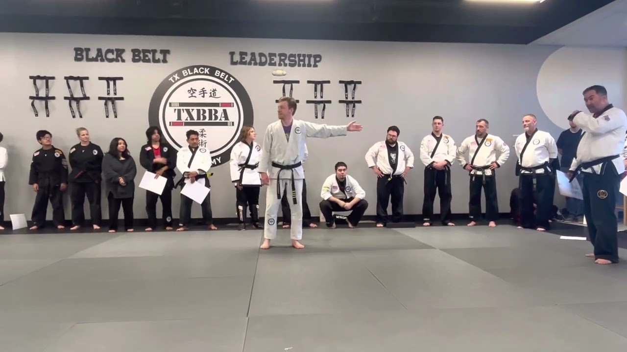 Master Donnie Bedore being promoted to 5th degree black belt.