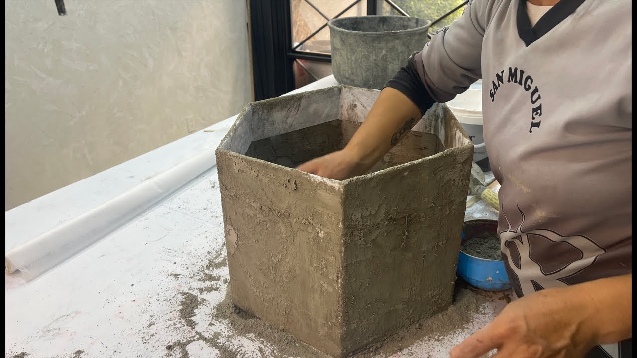 Cementing the fabric on the hexagon planter to make the transition to concrete!
