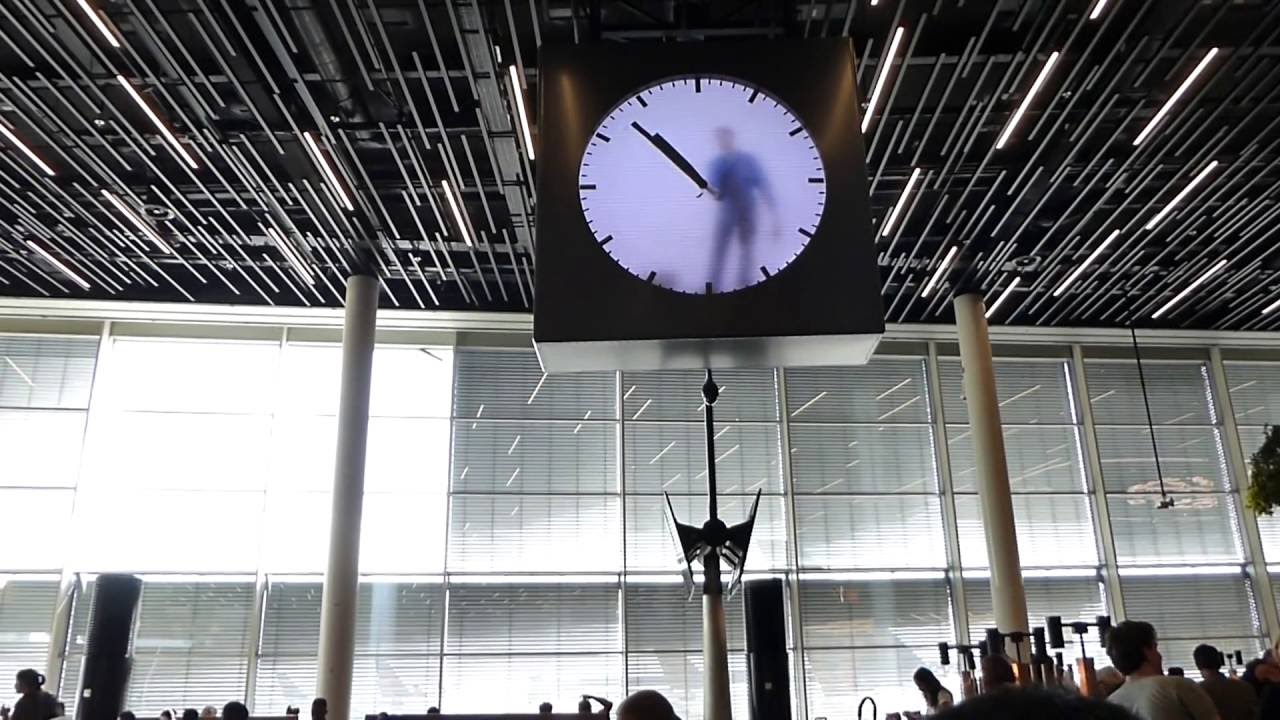 Human clock at Amsterdam airport