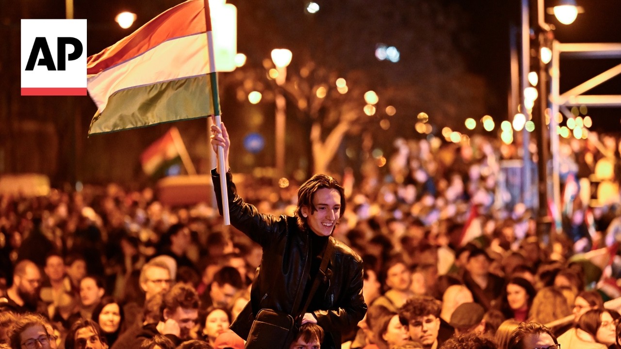 Celebrations as Hungarian opposition leader wins election and Orban concedes defeat