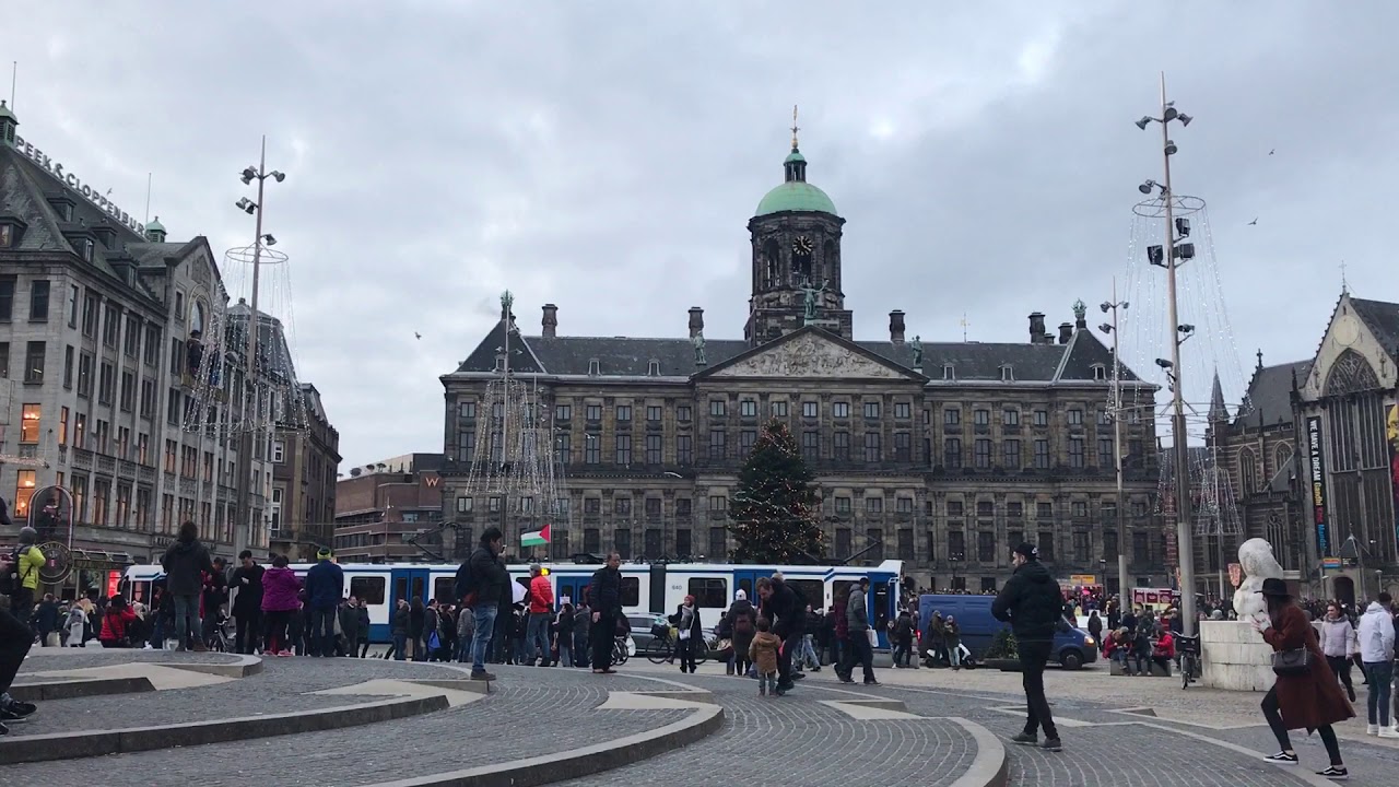Amsterdam Dam Square. Bell chimes.