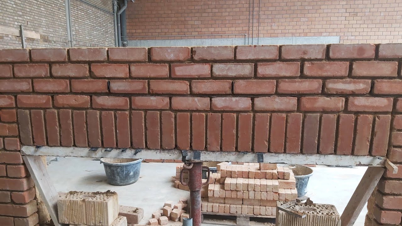 project #3 metselen van strekkenlaag facade met 1 raamopening