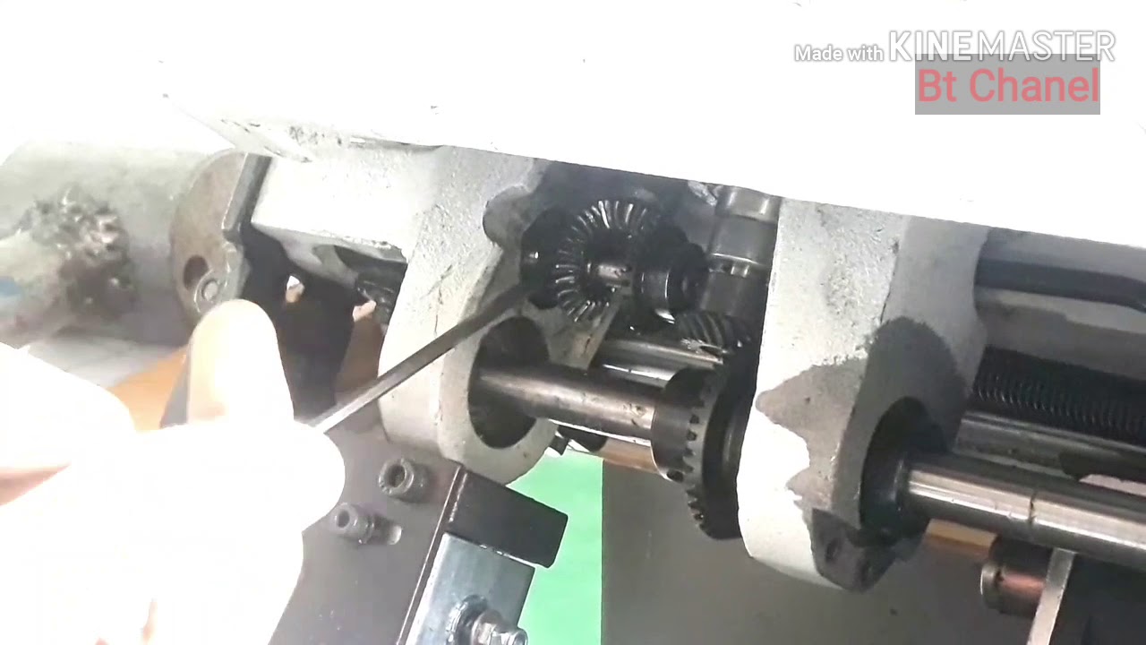 Sửa máy may trụ 1 kim(bánh xe dưới đẩy liệu bị kẹt).