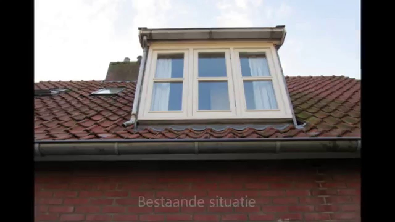 Dakkapel afgewerkt met zink en dakpannen door JWK Bouw Winterswijk, vertrouwd met bouw