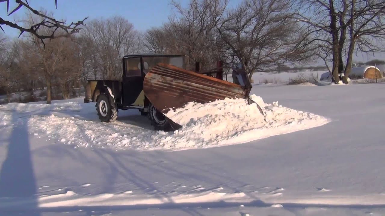 Dodge M37 Power Wagon plowing snow