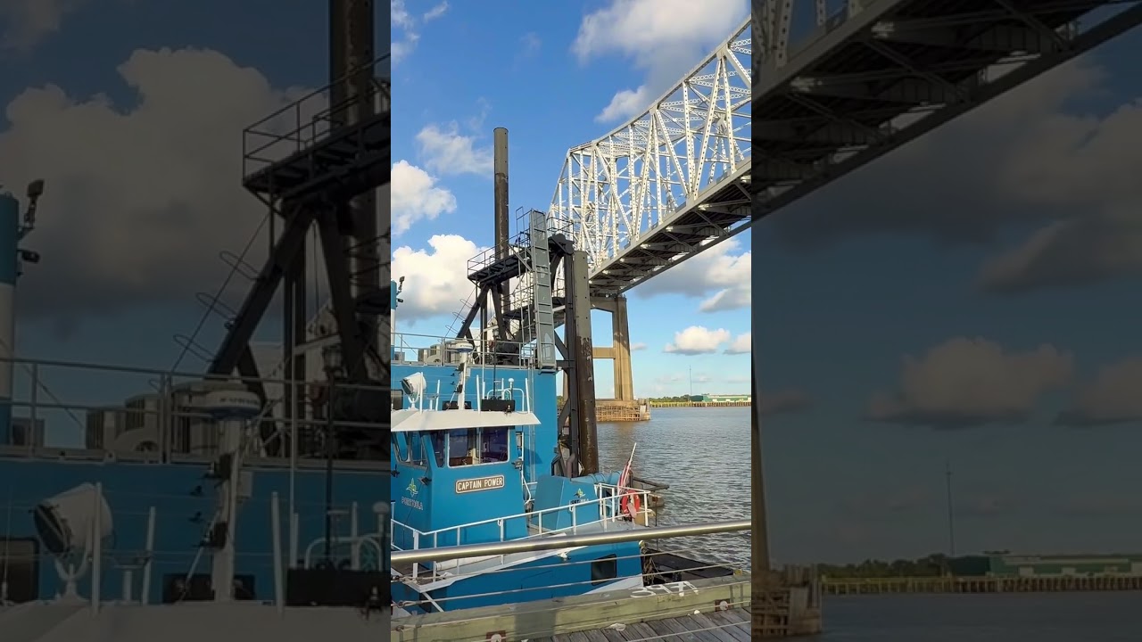 Port of New Orleans dredge on Mississippi River under bridges #neworleans #mississippiriver