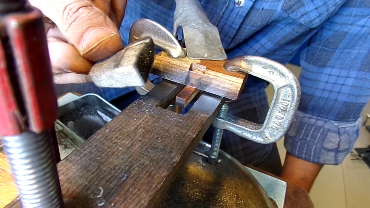reapplication of graphite to piano action parts.
