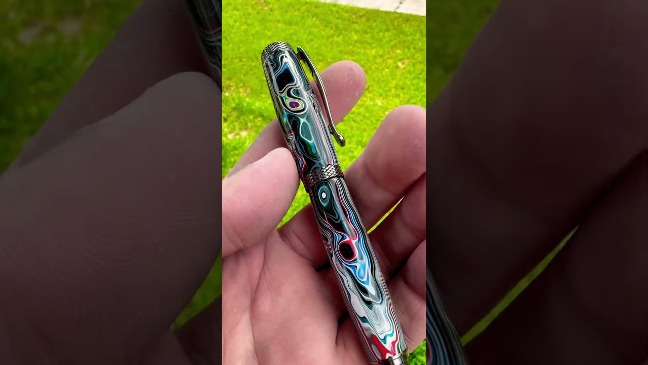 Fordite Rollerball Pen #rollerballpen #fordite #oneofakind #handmade #artisan #pen #lathe #resin