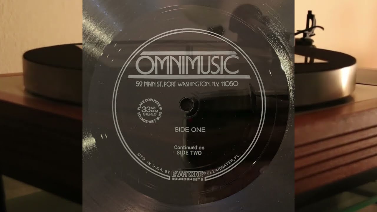 Omnimusic - Eva-Tone Soundsheet - vinyl lp - production music library sampler of Omnimusic catalog