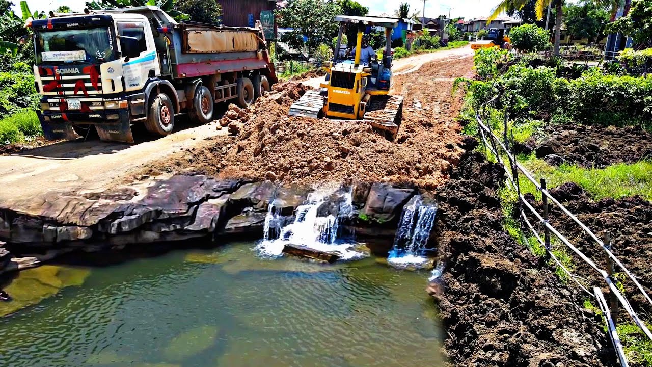 Perfect Road Base! Dump Trucks Unload Rocks While Komatsu Bulldozer Levels New Rural Road .good