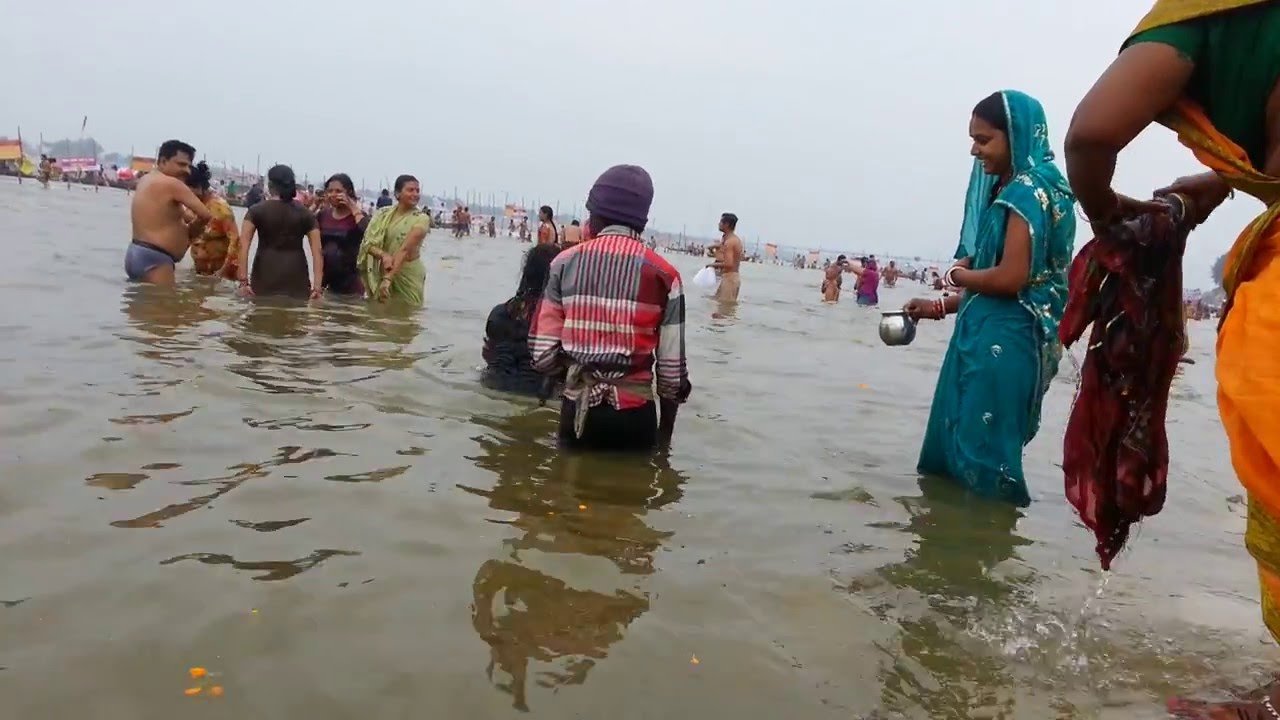 Kumbh Mela 2013 - Women taking holy dip