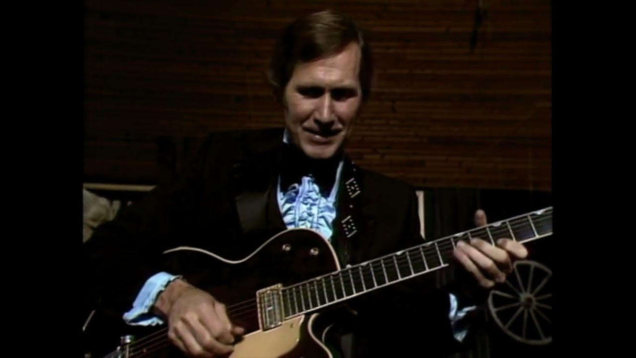 Chet Atkins - Medley: The Three Bells, I Can't Stop Loving You/Java and more